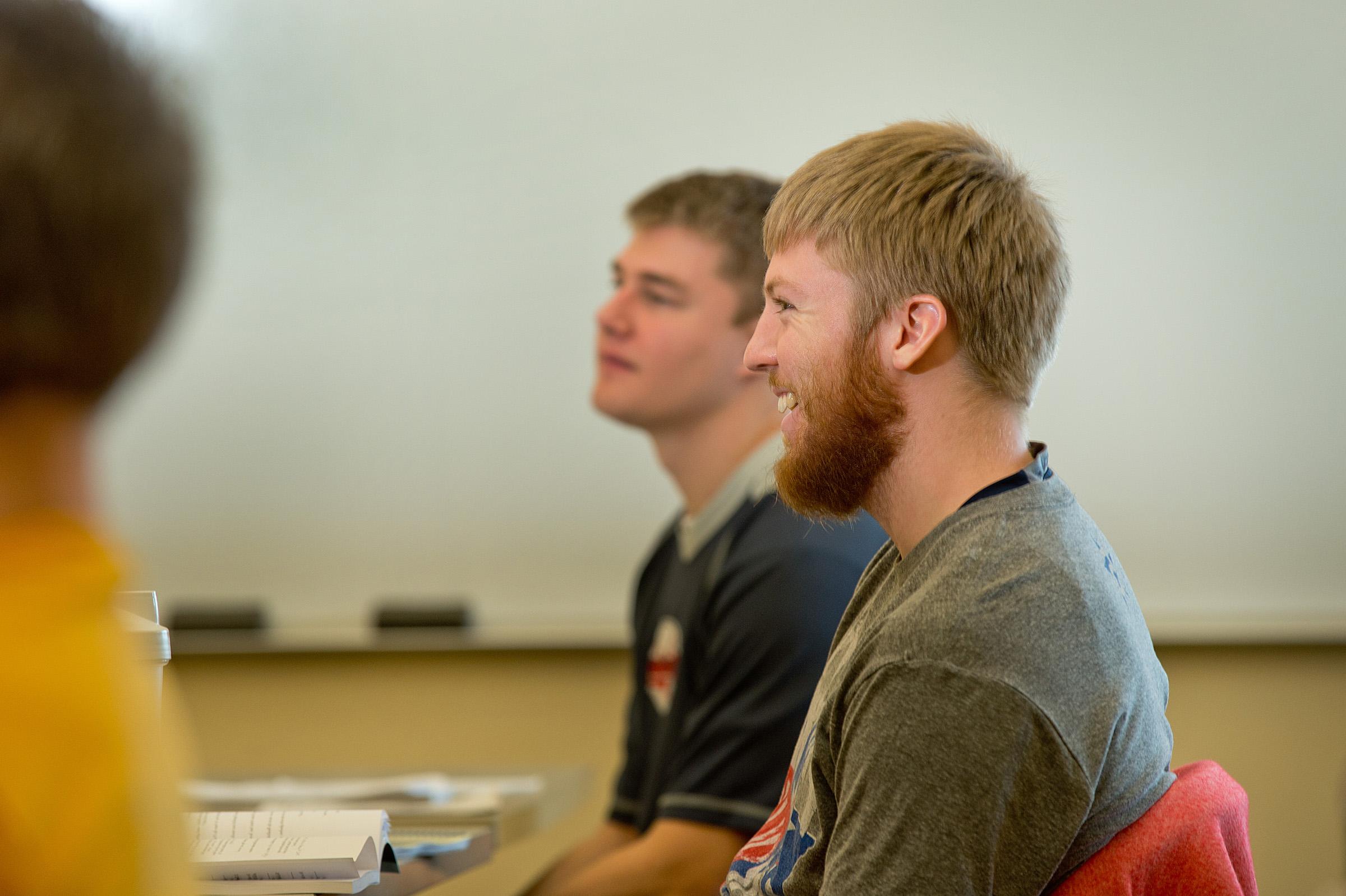 student smiling in class